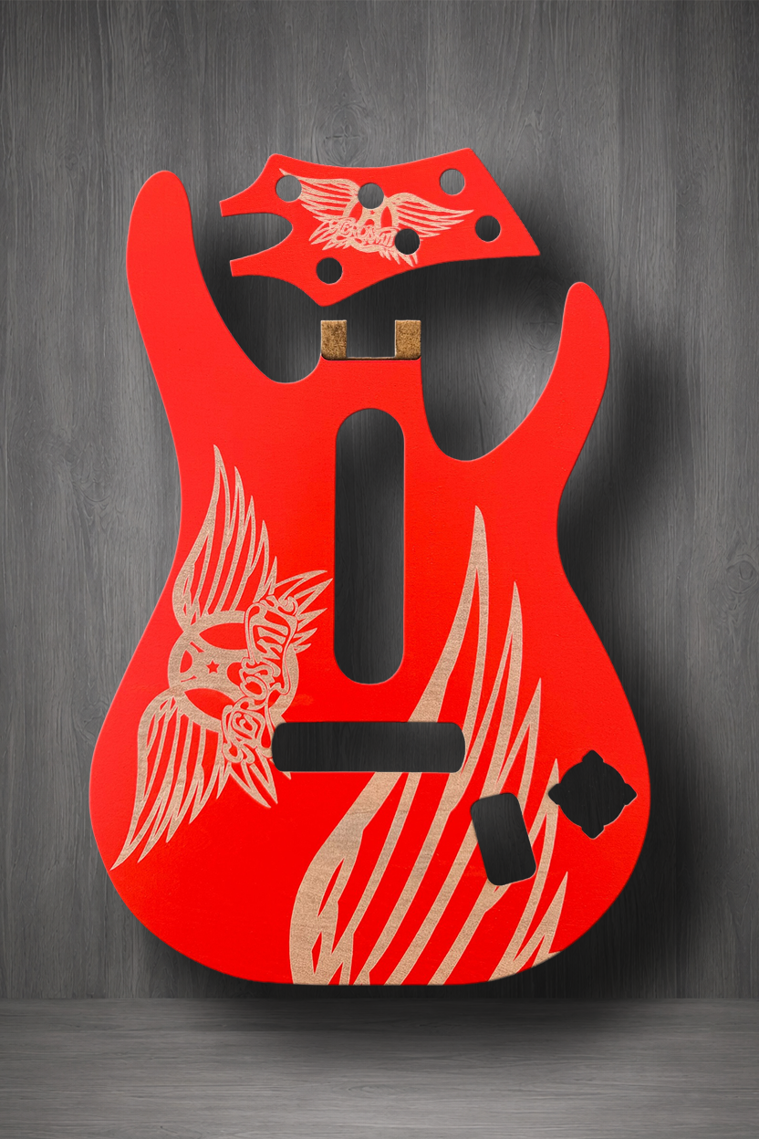A bright red MagnaPlate set with white winged flame Aerosmith logo